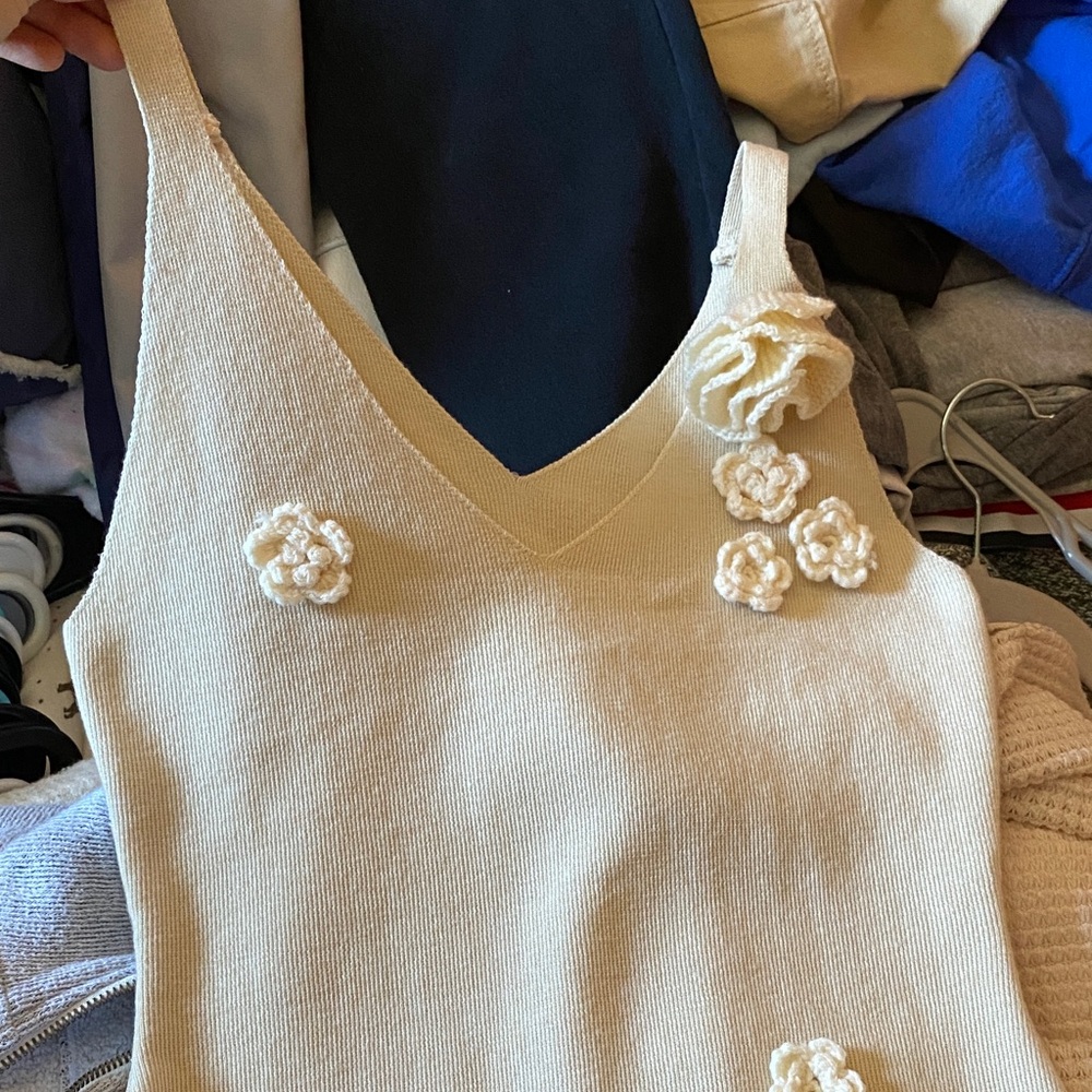 Elegant Cream Knit Top with Floral Accents